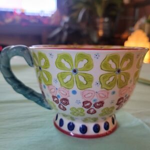 Anthropologie 12 Oz.Floral Patterned Cup With Blue Handle